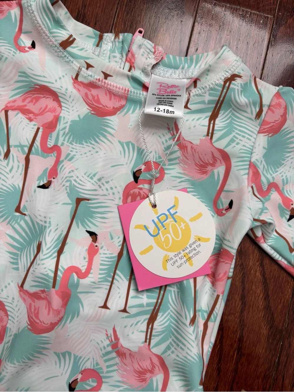 Ruffle Butts Flamingo Print Long Sleeve Baby Swimsuit